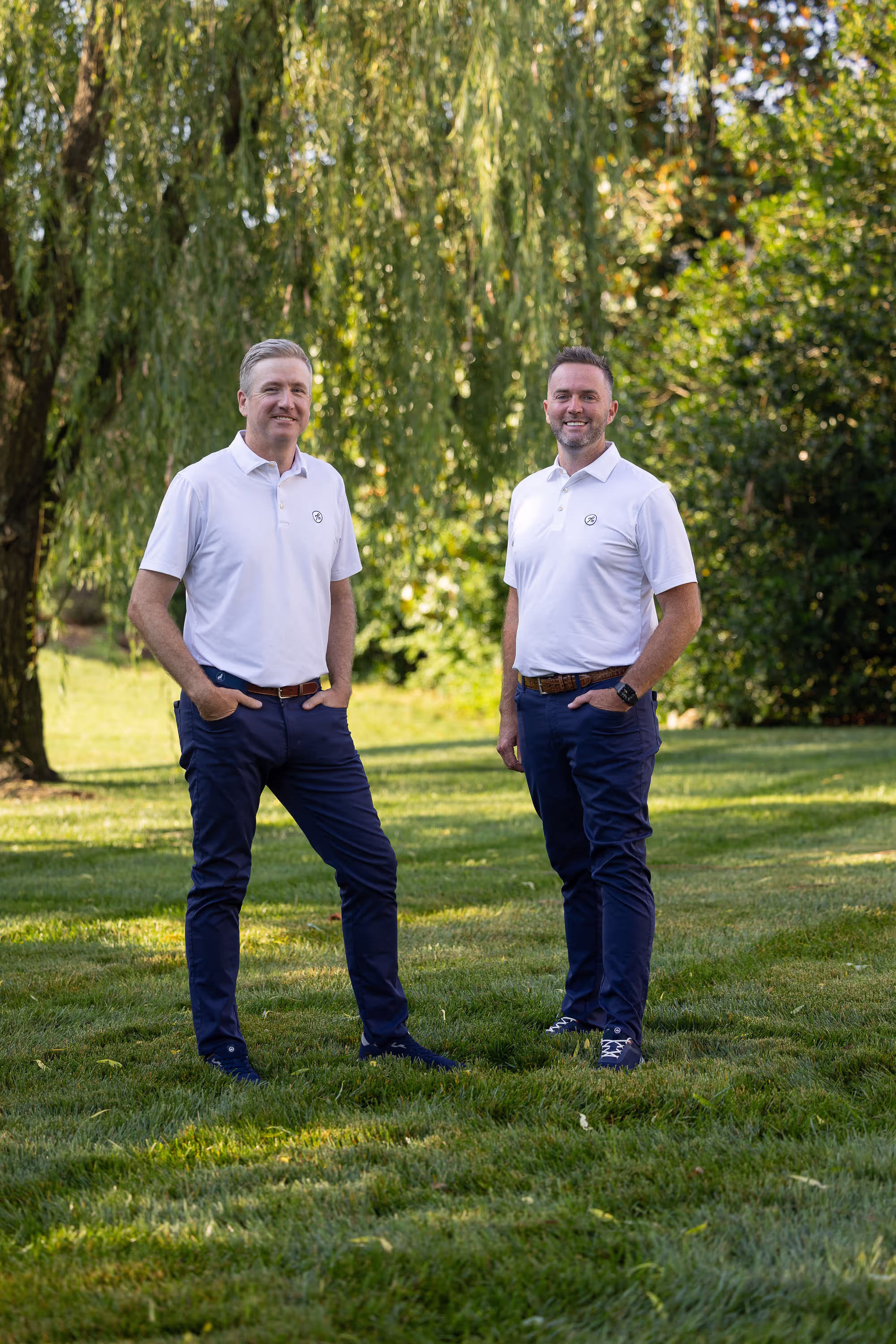 Pure Turf team members on a Middle Tennessee lawn